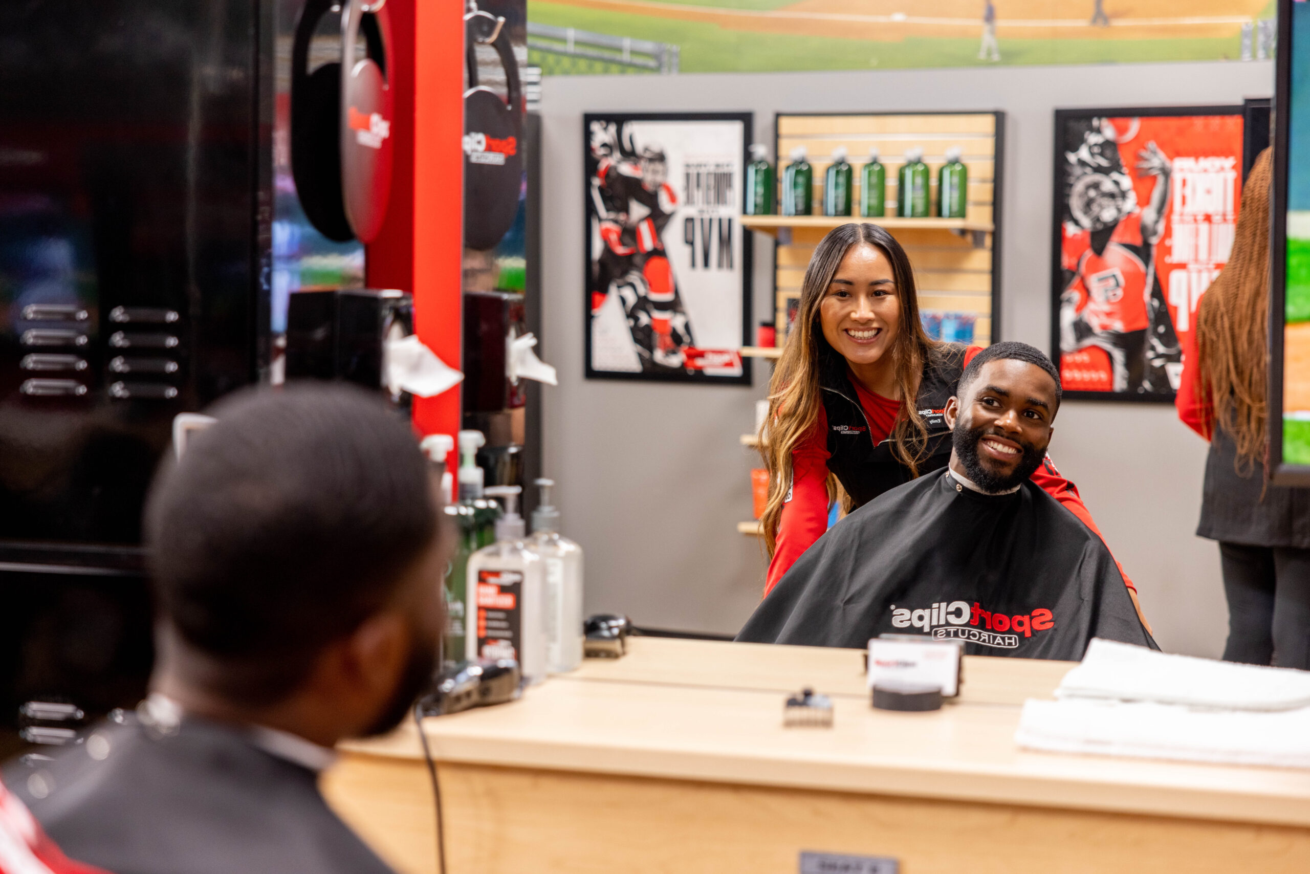 Ellipse 52 man admiring haircut