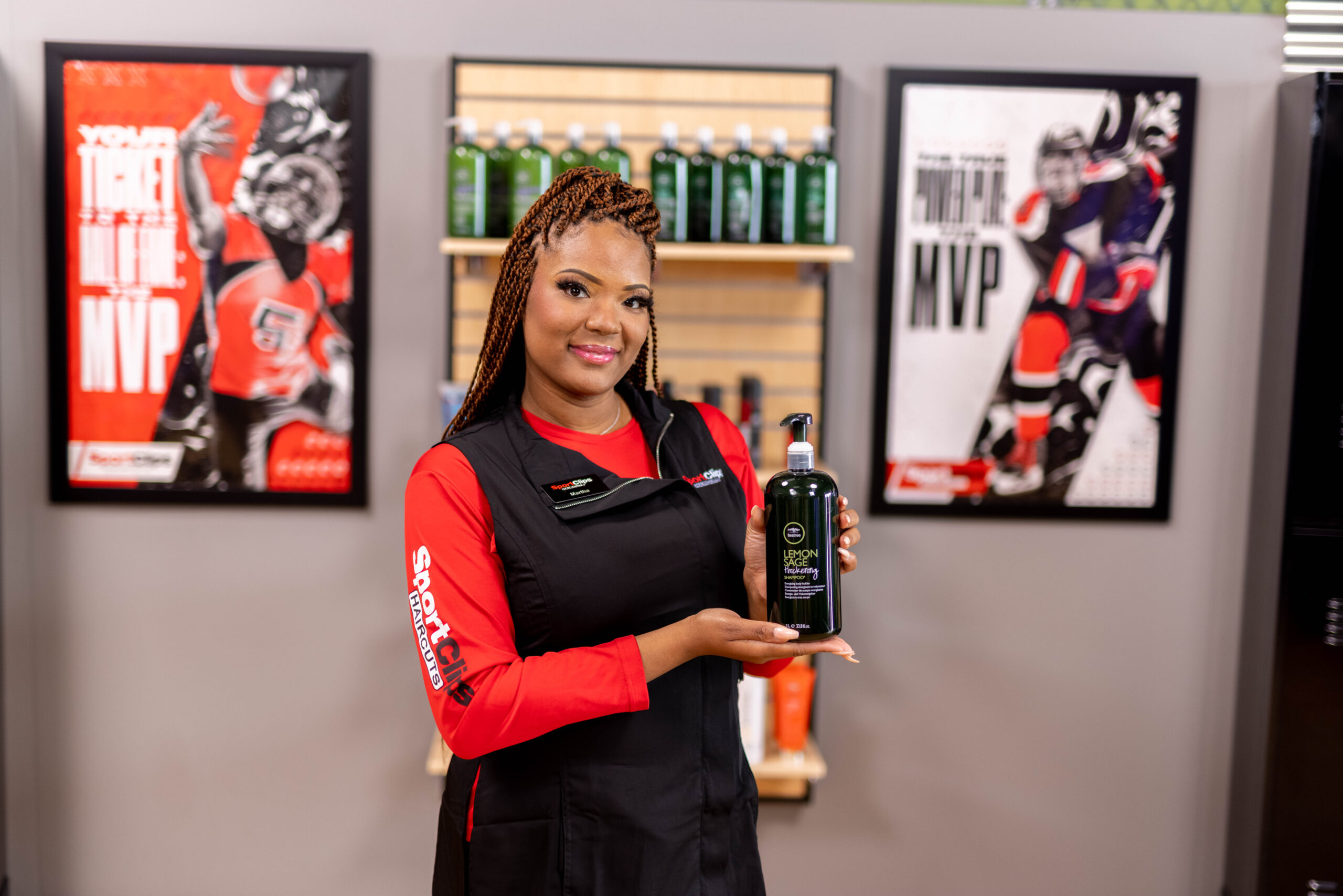 woman holding hair care product